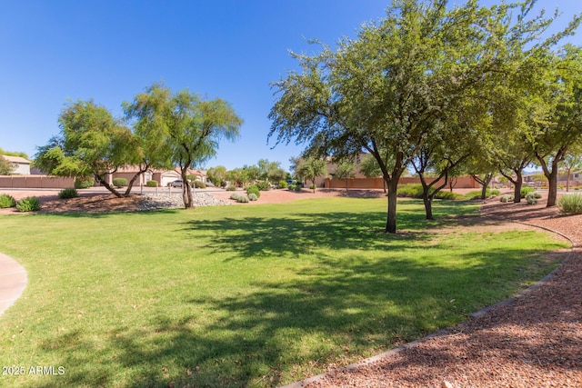 7725 S 47th Ln, Laveen, AZ 85339 - surrounding community featuring a lawn