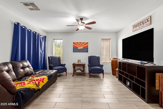 7725 S 47th Ln, Laveen, AZ 85339 - living area with ceiling fan and baseboards