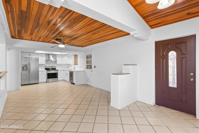 foyer with baseboards, a ceiling fan, lofted ceiling, wood ceiling, and light tile patterned flooring