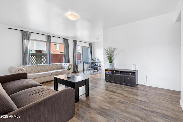 living room with wood finished floors