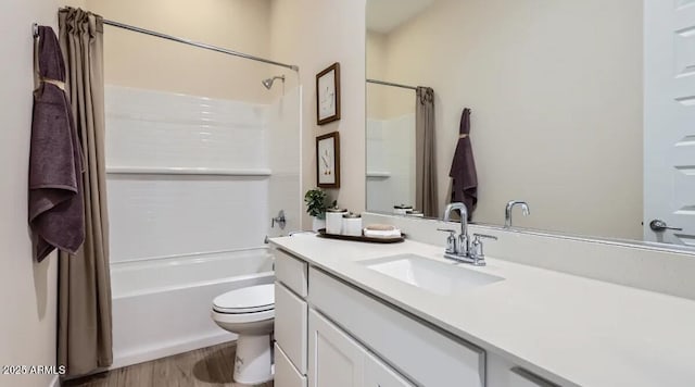 23244 W Tamarisk Ave, Buckeye, AZ 85326 - bathroom featuring vanity, washtub / shower combination, and wood finished floors