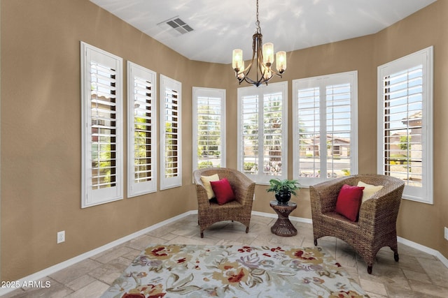 5342 S Citrus Ct, Gilbert, AZ 85298 - sitting room featuring a chandelier, baseboards, and stone tile floors