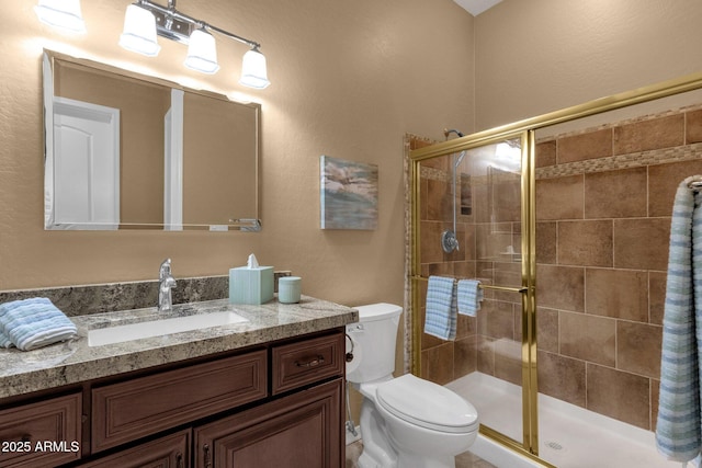 5342 S Citrus Ct, Gilbert, AZ 85298 - full bath featuring toilet, vanity, a shower stall, and a textured wall
