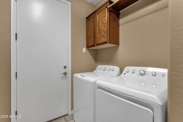 5342 S Citrus Ct, Gilbert, AZ 85298 - laundry area with washing machine and clothes dryer, cabinet space, and a textured wall