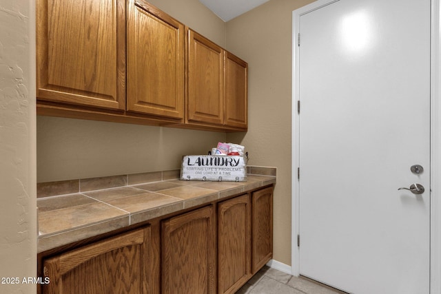 5342 S Citrus Ct, Gilbert, AZ 85298 - laundry room featuring light tile patterned floors
