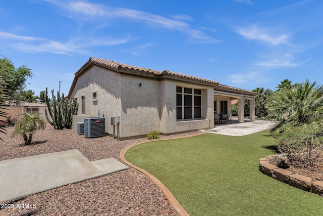 5342 S Citrus Ct, Gilbert, AZ 85298 - back of house with a patio, stucco siding, a yard, central AC unit, and a tiled roof