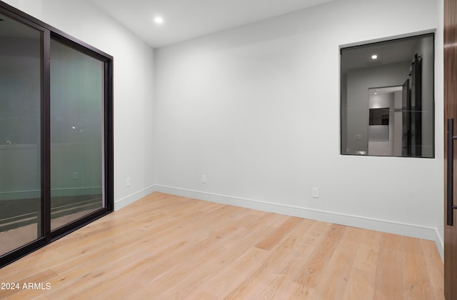 empty room featuring wood-type flooring