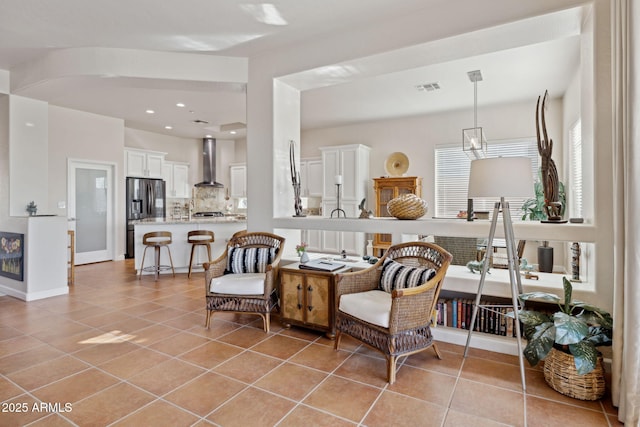 interior space featuring light tile patterned floors