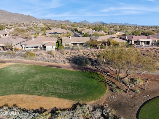 birds eye view of property featuring a mountain view