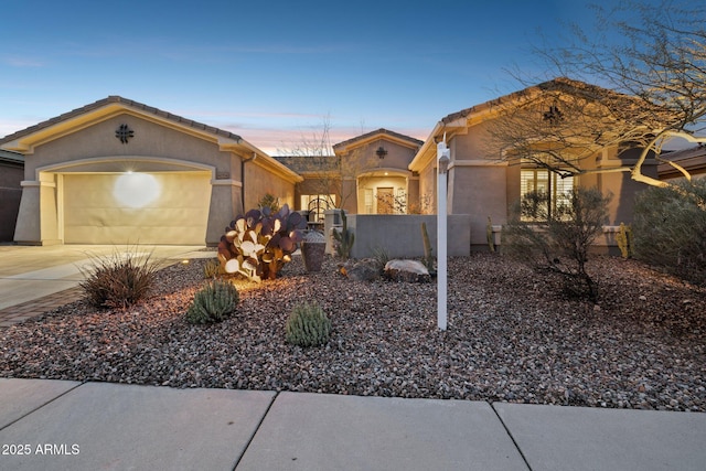 ranch-style home with a garage