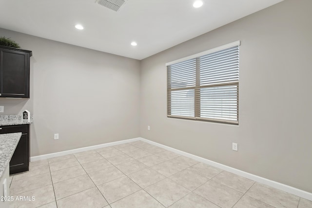 30776 W Earll Dr, Buckeye, AZ 85396 - unfurnished dining area with recessed lighting, baseboards, and light tile patterned flooring