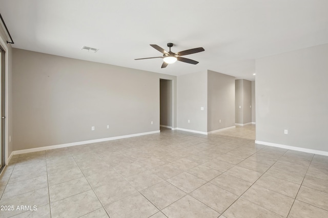 30776 W Earll Dr, Buckeye, AZ 85396 - unfurnished room with a ceiling fan, light tile patterned floors, and baseboards