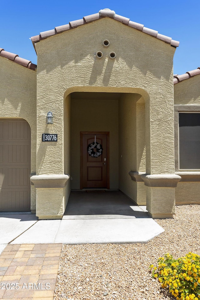 30776 W Earll Dr, Buckeye, AZ 85396 - view of exterior entry featuring stucco siding