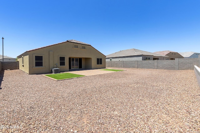 30776 W Earll Dr, Buckeye, AZ 85396 - back of property with stucco siding, a fenced backyard, a patio, and cooling unit