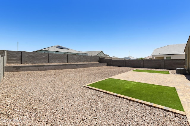 30776 W Earll Dr, Buckeye, AZ 85396 - fenced backyard with a patio and central AC