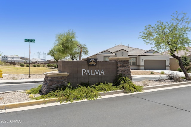 30776 W Earll Dr, Buckeye, AZ 85396 - community / neighborhood sign with an attached garage and concrete driveway