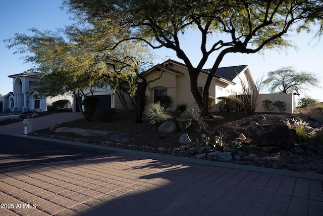 view of property exterior featuring a garage