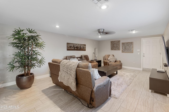 living room featuring ceiling fan