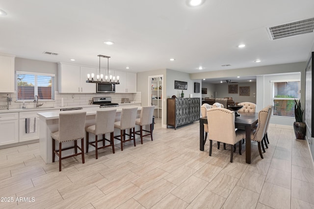 dining room featuring sink