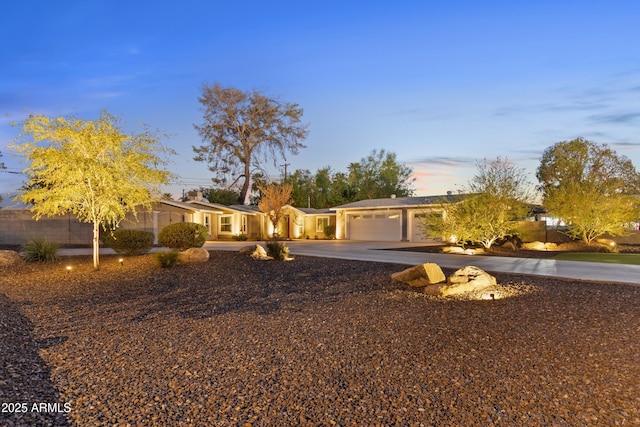 ranch-style house featuring a garage