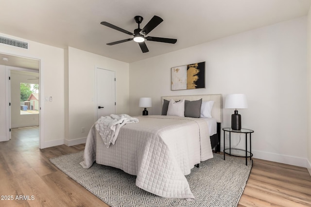 510 N Entrada St, Chandler, AZ 85226 - bedroom with wood finished floors, baseboards, and ceiling fan