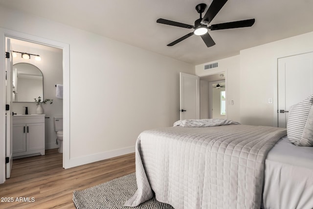 510 N Entrada St, Chandler, AZ 85226 - bedroom with light wood-style floors, baseboards, ensuite bathroom, and a ceiling fan