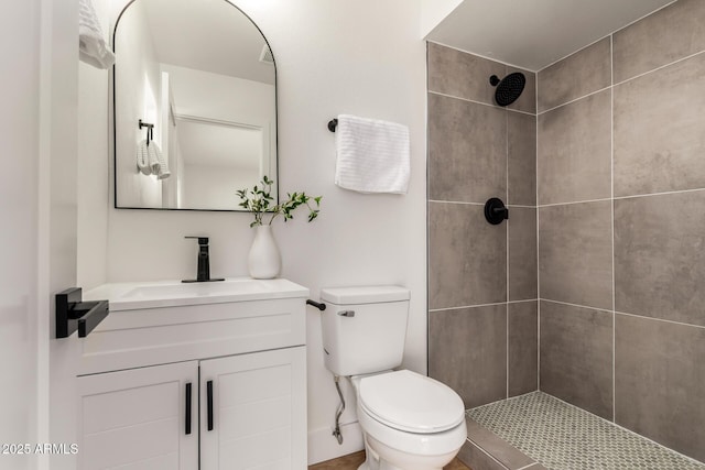510 N Entrada St, Chandler, AZ 85226 - bathroom featuring tiled shower, vanity, and toilet