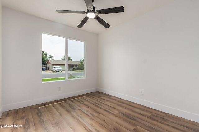 510 N Entrada St, Chandler, AZ 85226 - spare room with healthy amount of natural light, baseboards, wood finished floors, and ceiling fan