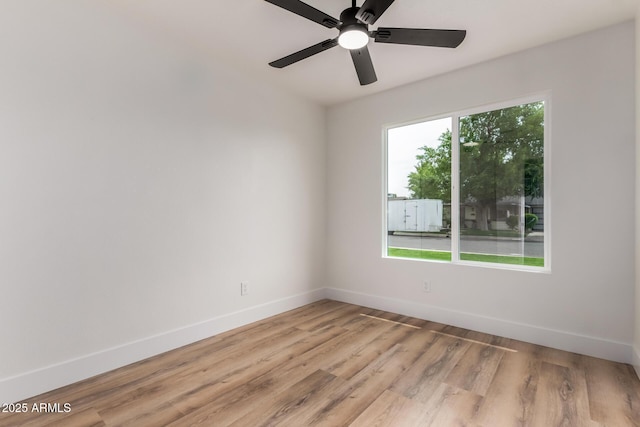 510 N Entrada St, Chandler, AZ 85226 - spare room featuring baseboards, light wood-style flooring, and ceiling fan