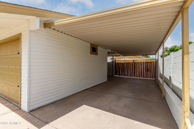 510 N Entrada St, Chandler, AZ 85226 - view of patio / terrace featuring an attached carport and a garage