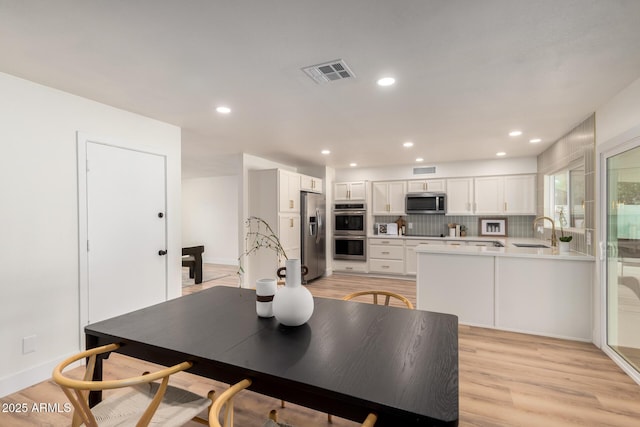 510 N Entrada St, Chandler, AZ 85226 - dining space featuring light wood-style flooring, recessed lighting, and baseboards