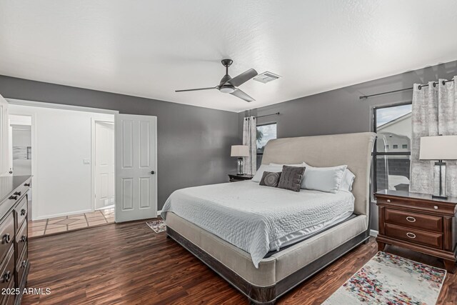 9035 W Villa Chula, Peoria, AZ 85383 - bedroom with baseboards, ceiling fan, visible vents, and wood finished floors