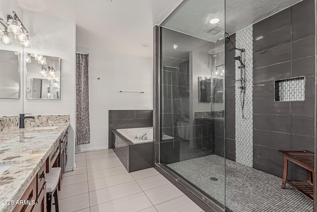 9035 W Villa Chula, Peoria, AZ 85383 - full bath with vanity, baseboards, tiled shower, a bath, and tile patterned floors