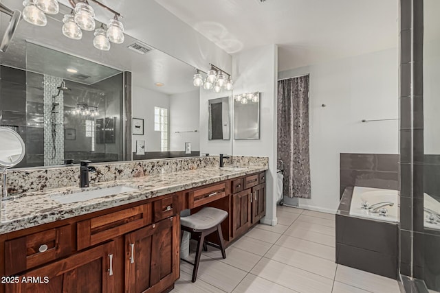 9035 W Villa Chula, Peoria, AZ 85383 - full bath featuring a sink, double vanity, tile patterned floors, a tub, and curtained shower