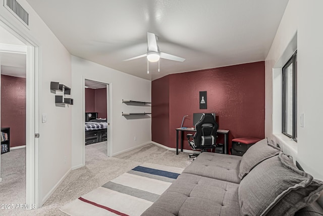 9035 W Villa Chula, Peoria, AZ 85383 - living area featuring visible vents, a ceiling fan, carpet, and baseboards