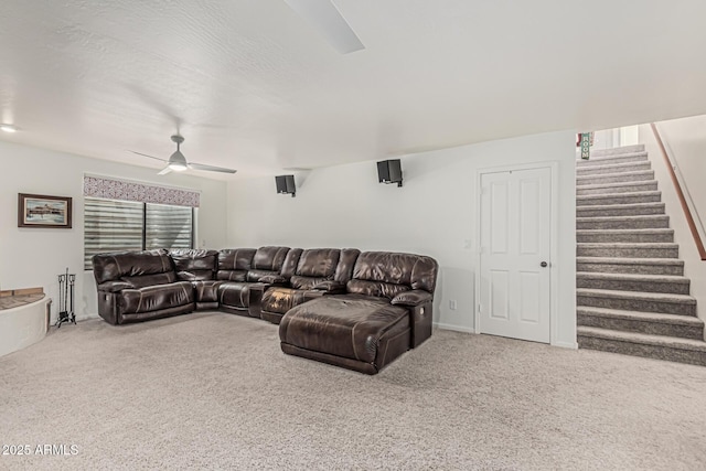9035 W Villa Chula, Peoria, AZ 85383 - living area featuring stairway, ceiling fan, and carpet