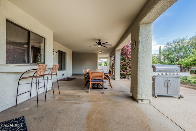 9035 W Villa Chula, Peoria, AZ 85383 - view of patio / terrace featuring outdoor dining area, area for grilling, and ceiling fan