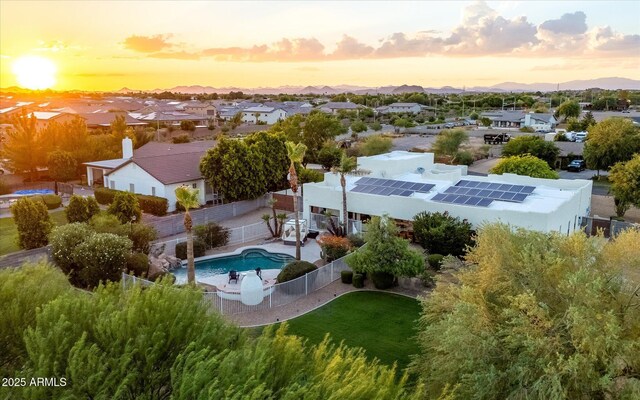 9035 W Villa Chula, Peoria, AZ 85383 - aerial view at dusk featuring a residential view and a mountain view