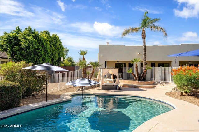 9035 W Villa Chula, Peoria, AZ 85383 - view of swimming pool with a fenced backyard, a ceiling fan, a fenced in pool, and a patio area
