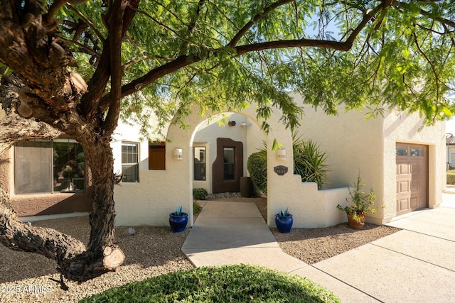 9035 W Villa Chula, Peoria, AZ 85383 - property entrance featuring driveway and stucco siding