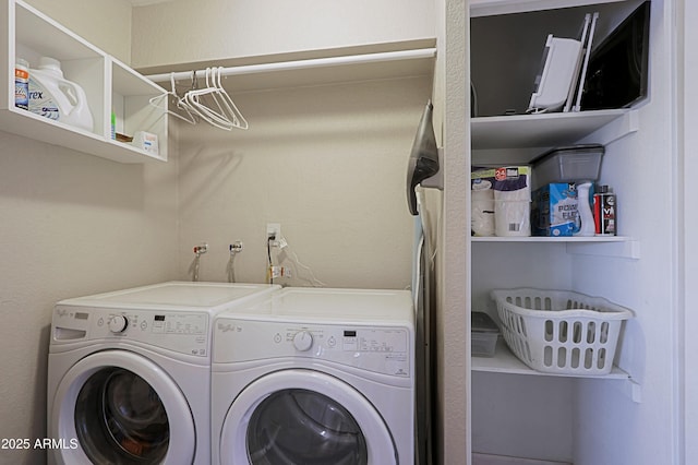 laundry room featuring washer and clothes dryer