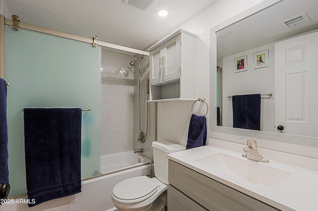 full bathroom with toilet, vanity, and bath / shower combo with glass door