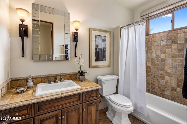 bathroom with vanity, toilet, and shower / tub combo with curtain