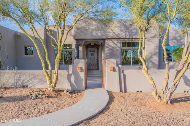 view of front of home with stucco siding