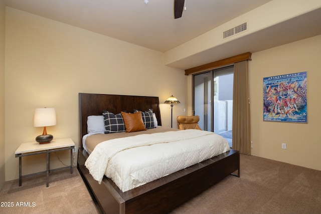 carpeted bedroom with ceiling fan and access to exterior