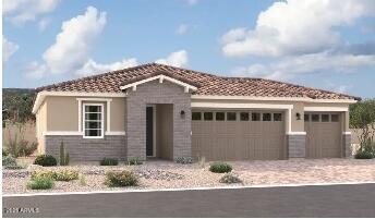 12390 W Marguerite Ave, Avondale, AZ 85323 - view of front of house featuring an attached garage, decorative driveway, and a tiled roof