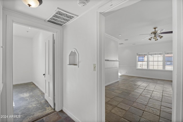 corridor with crown molding