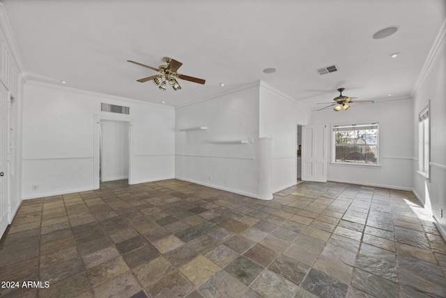 unfurnished living room with ceiling fan and crown molding