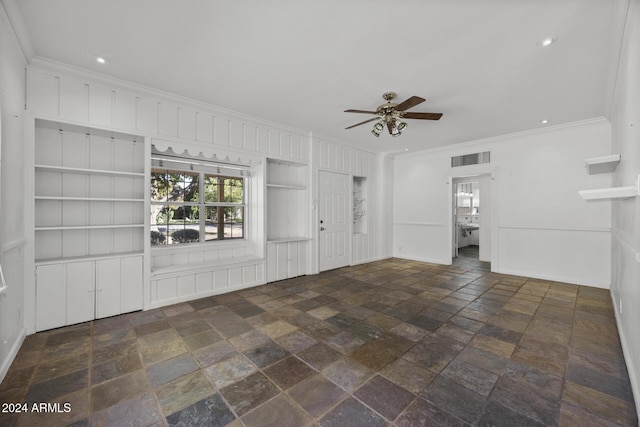 unfurnished living room with ceiling fan and ornamental molding