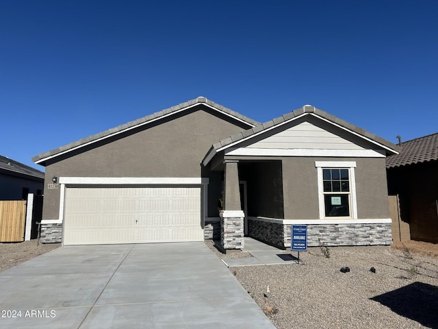 view of front of property with a garage